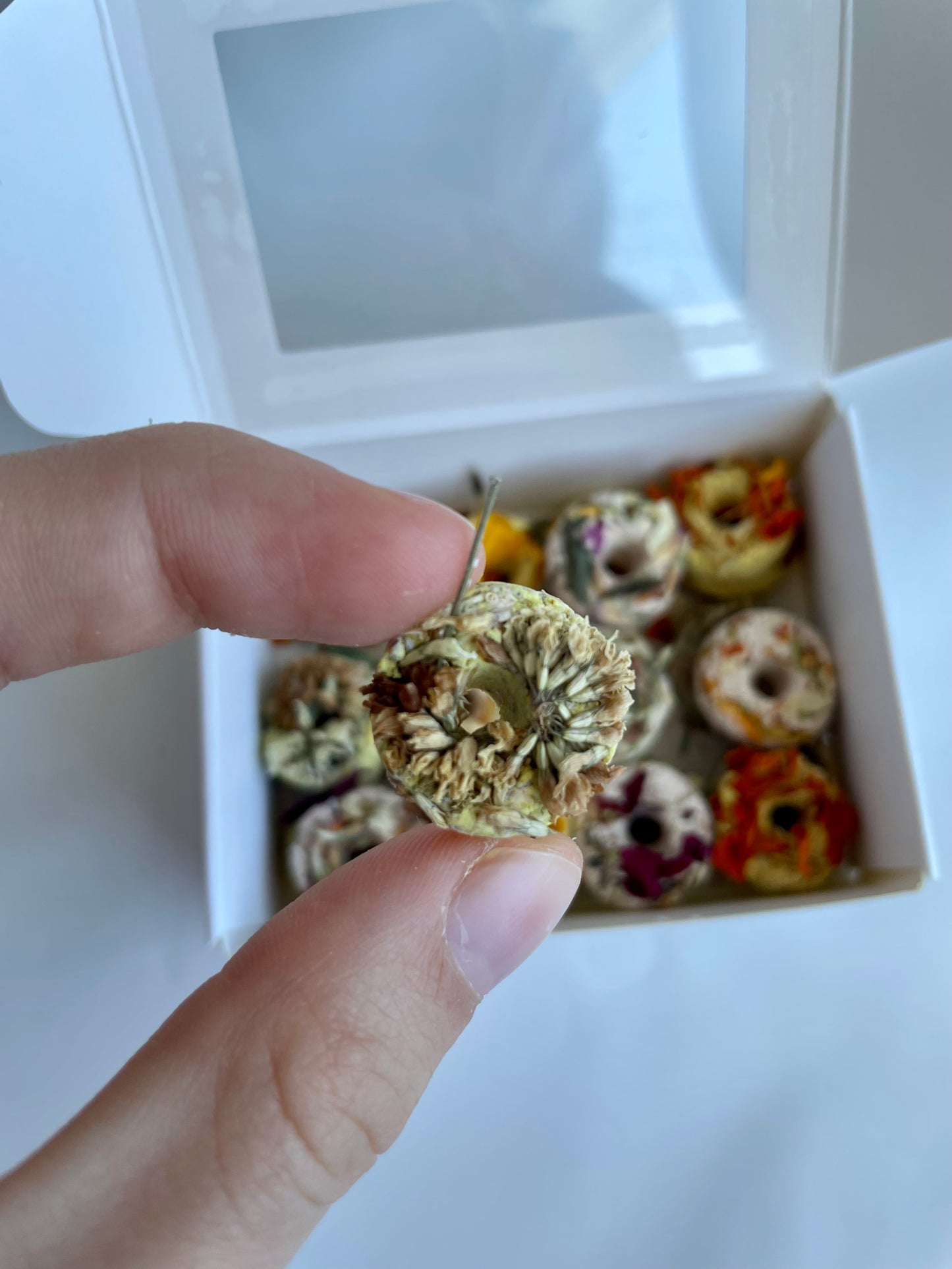 Gourmet donuts with spring flowers