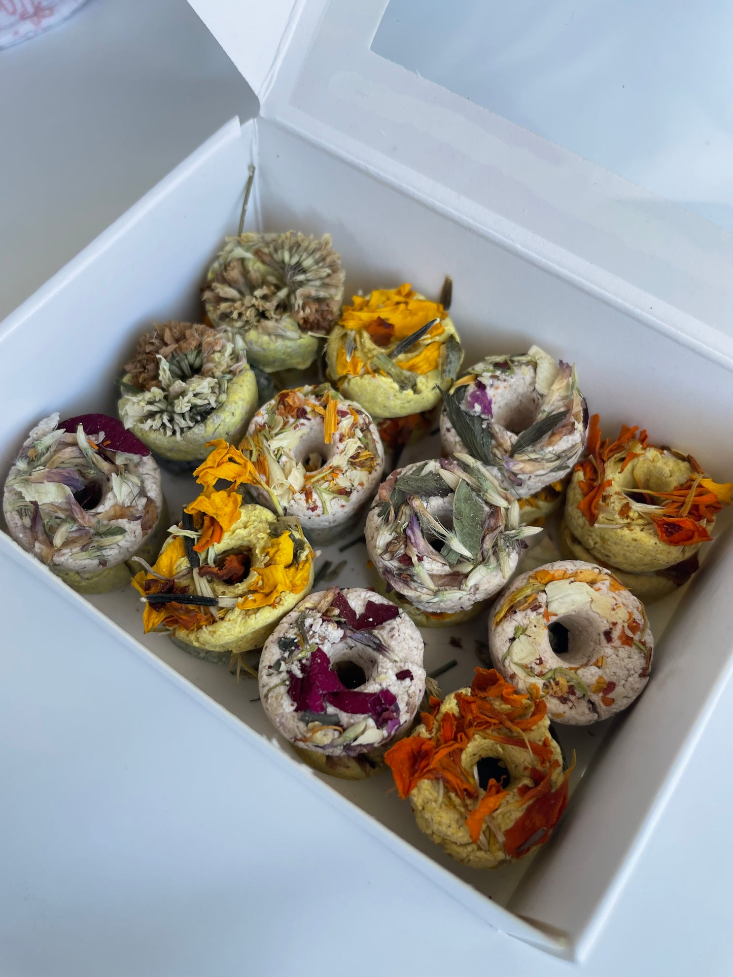 Gourmet donuts with spring flowers